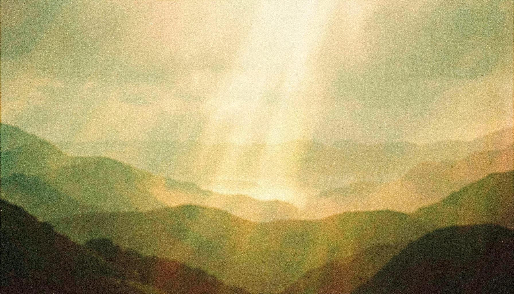 A warm analog film photograph with visible grain showing an abstract digital landscape of soft green and gold tones, gentle light rays filtering through a luminous virtual environment.